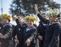A Royal New Zealand Navy recruit performs a pacific islands dance at Graduation 